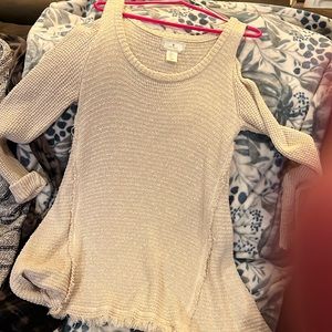Very stylish cold shoulder sweater.
